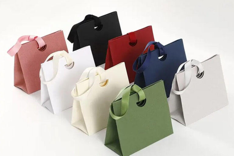Elegant Custom Ribbon Handle Shopping Paper Bags (8) Personalized shopping paper bags with ribbon handles for boutiques