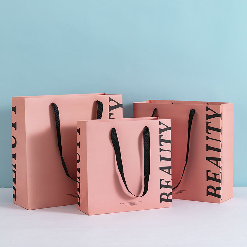 Luxury shopping paper bags for fashion and cosmetics brands