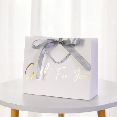 Luxury garment gift paper bags for fashion and boutique packaging