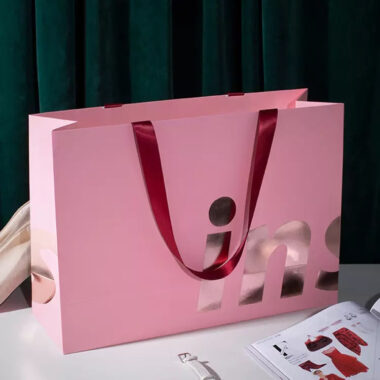 Luxury clothing and gift shopping paper bags with custom logos