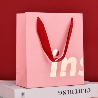 Luxury clothing and gift shopping paper bags with custom logos