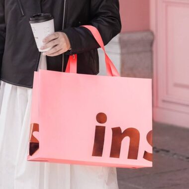 Luxury clothing and gift shopping paper bags with custom logos