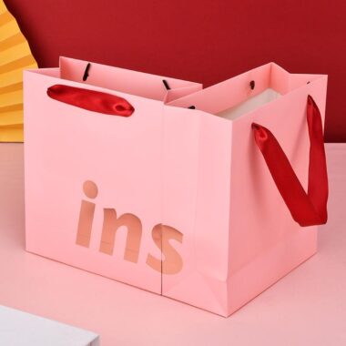 Luxury clothing and gift shopping paper bags with custom logos
