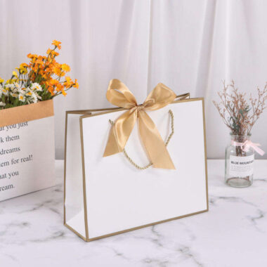Hot-selling luxury gift paper shopping bags with ribbon handles
