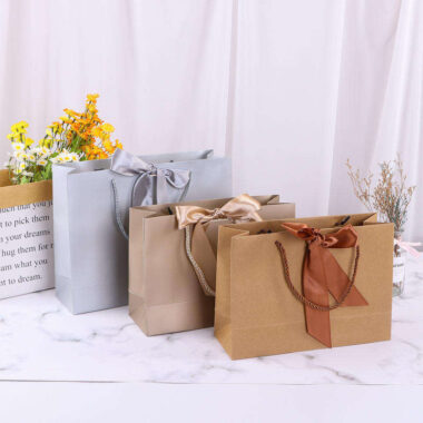 Hot-selling luxury gift paper shopping bags with ribbon handles
