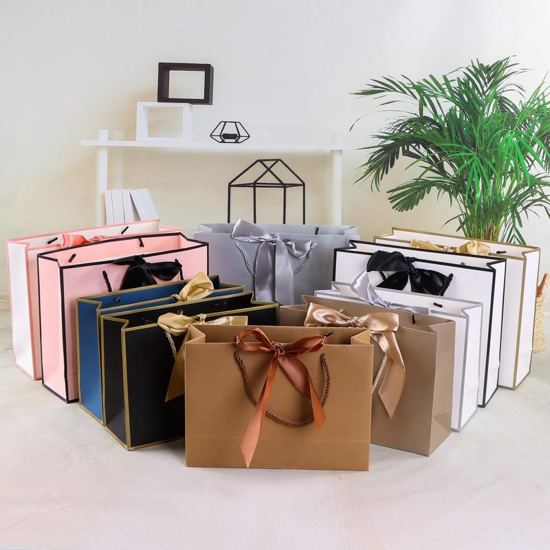Hot-selling luxury gift paper shopping bags with ribbon handles