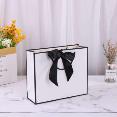 Hot-selling luxury gift paper shopping bags with ribbon handles