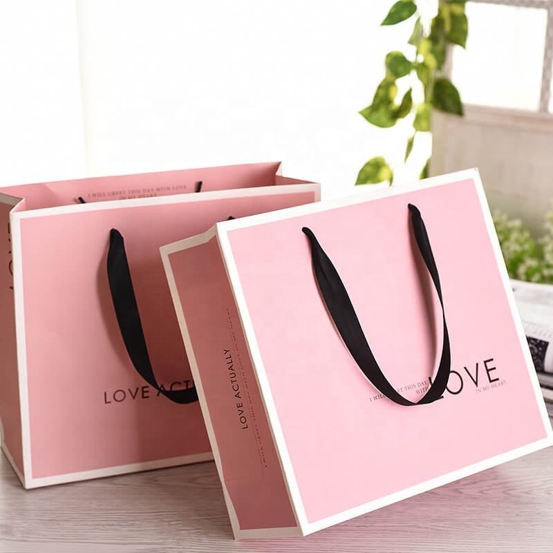 Custom printed luxury shopping paper bags for clothing brands