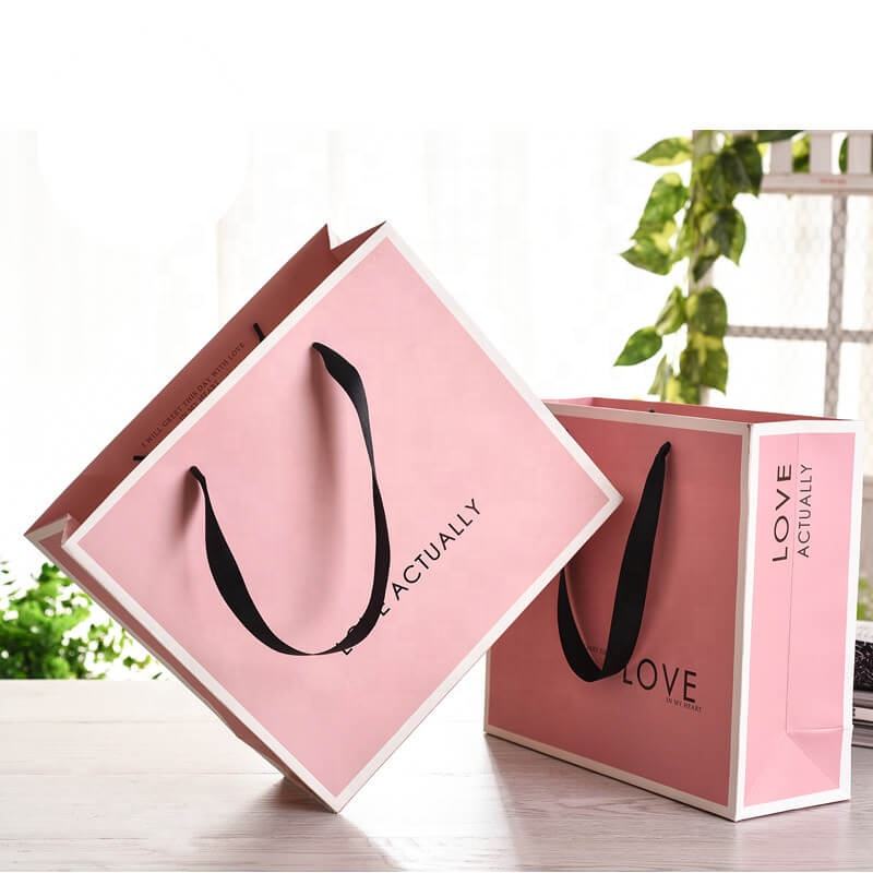 Custom printed luxury shopping paper bags for clothing brands