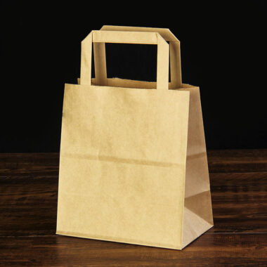 Biodegradable brown kraft paper bags for grocery and gift packaging