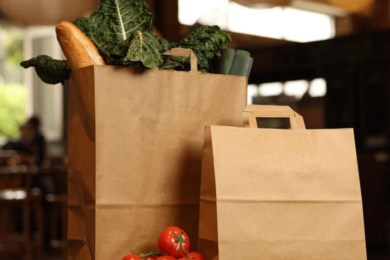 Brown Biodegradable Kraft Paper Bags (8) Biodegradable brown kraft paper bags for grocery and gift packaging