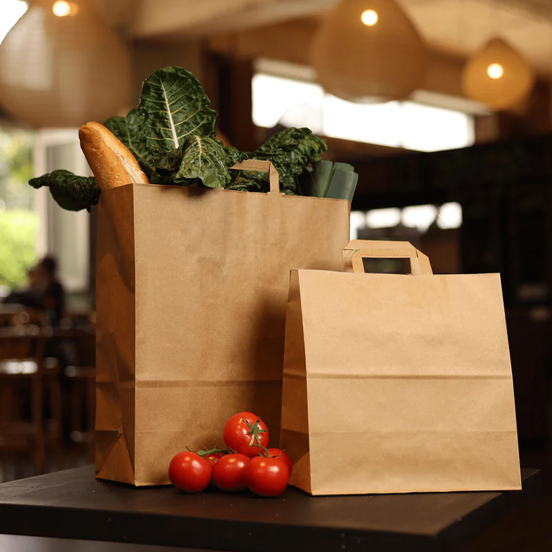 Biodegradable brown kraft paper bags for grocery and gift packaging