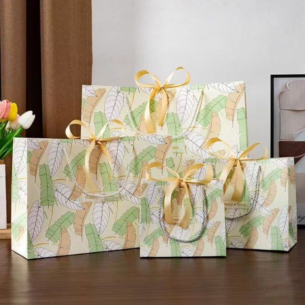Minimal green leaf shopping and gift paper bags