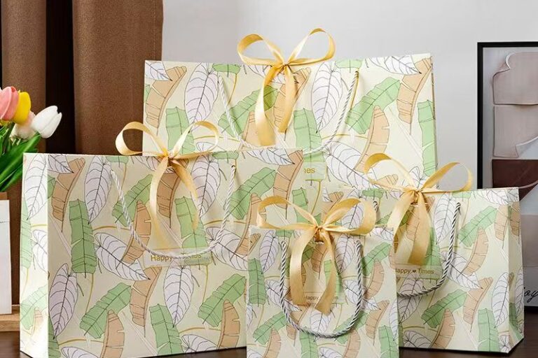 Minimal green leaf shopping and gift paper bags
